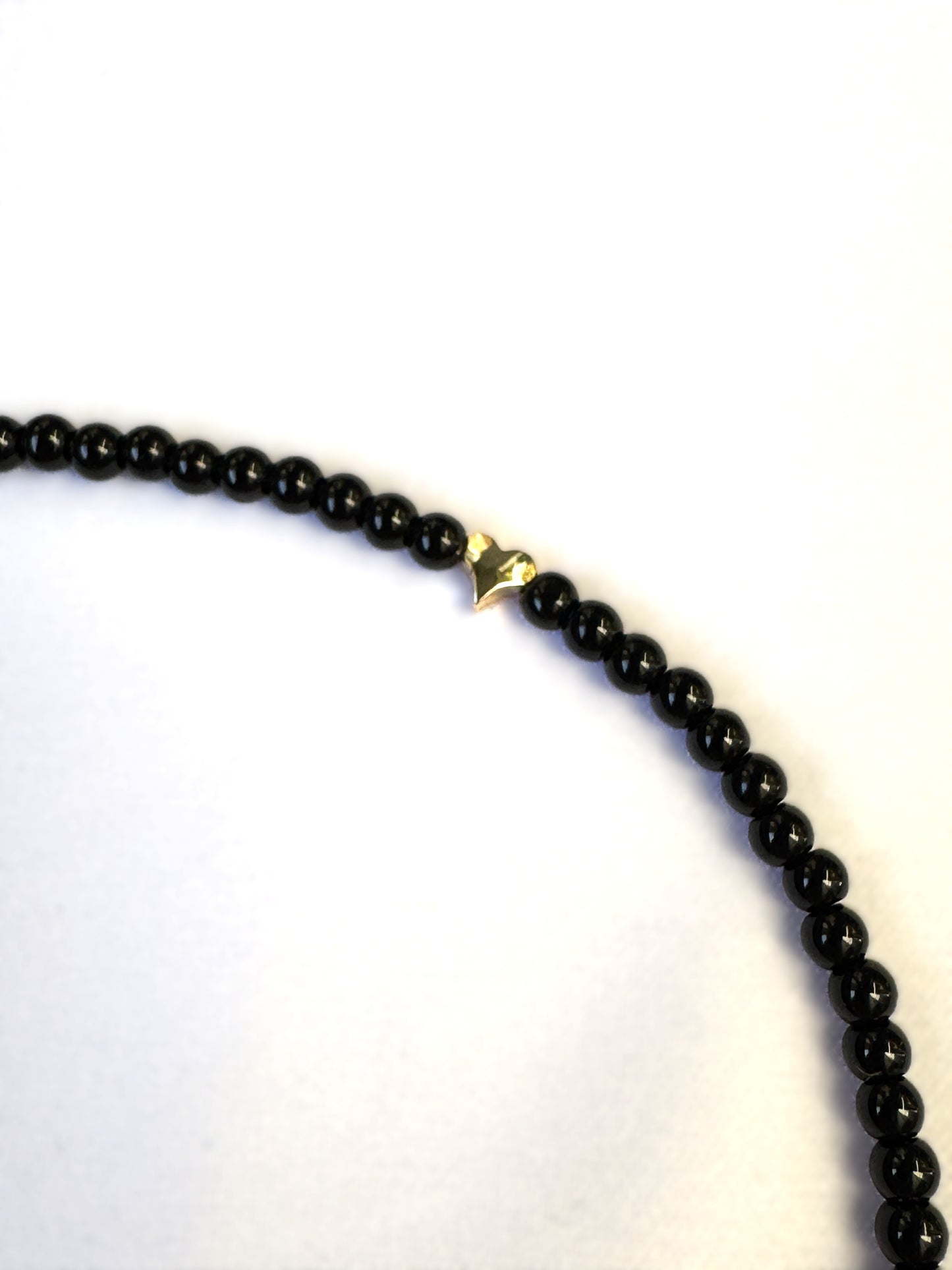 Collier en onyx avec fleur de lotus corail