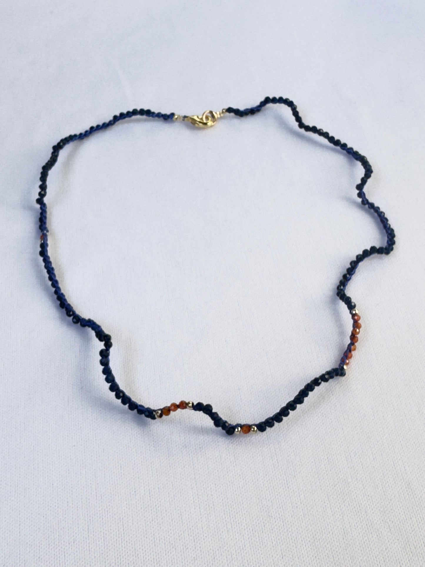 Collier crocheté spinelle bleu et zircon orange