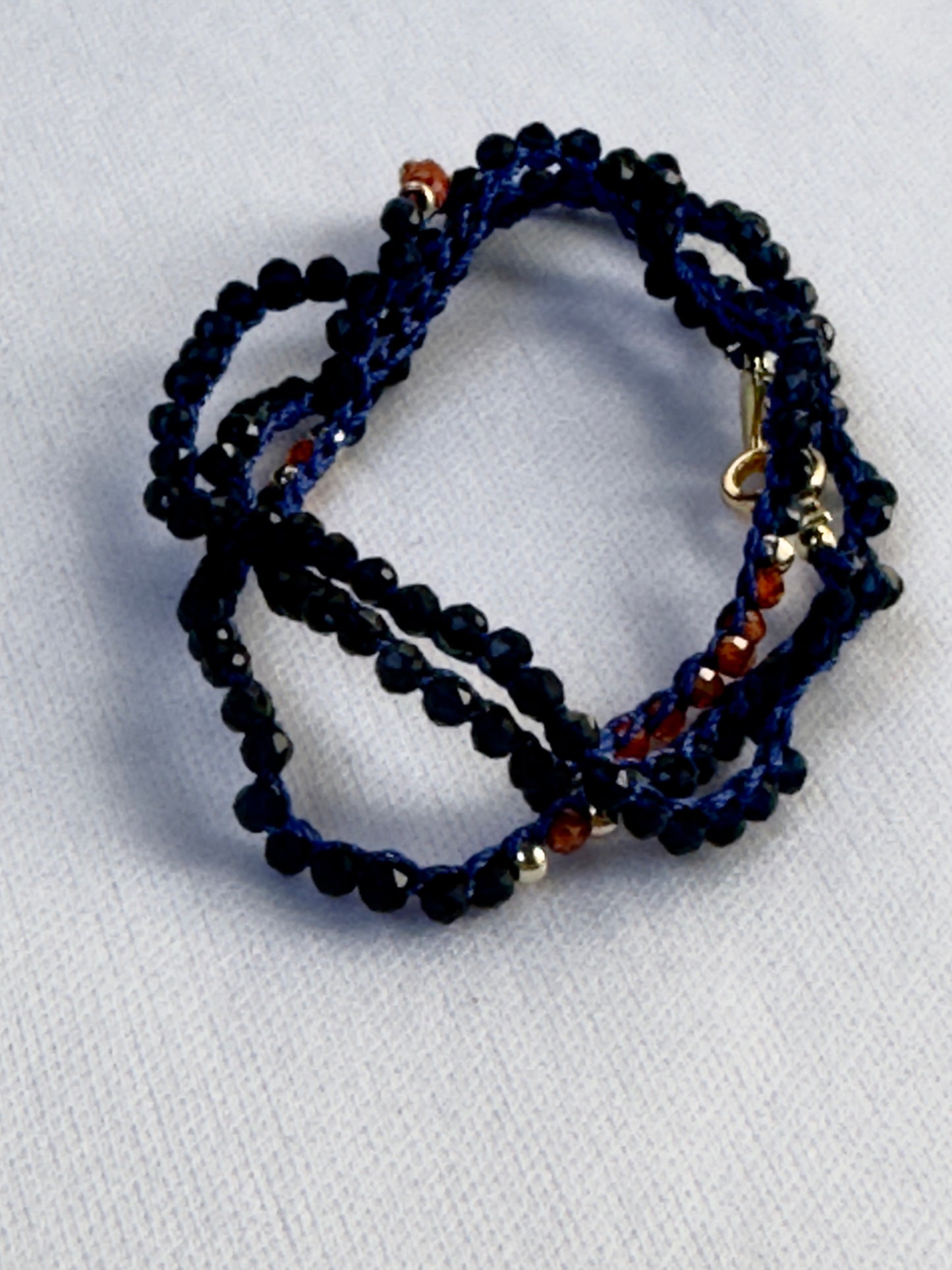 Collier crocheté spinelle bleu et zircon orange