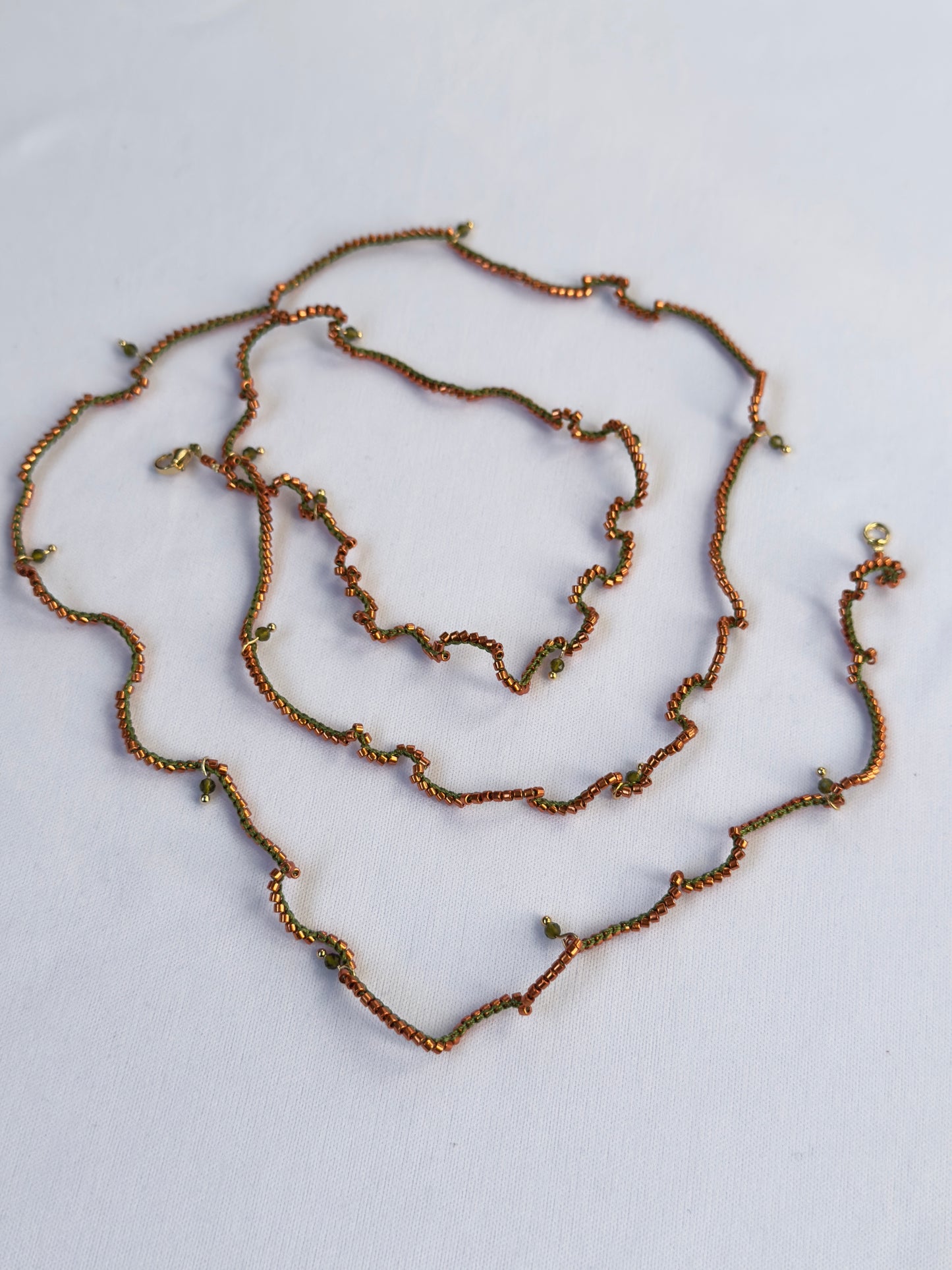 Choker perles orange et fil vert